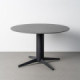 Mesa de comedor redonda cerámica efecto travertino negro y pie aspa negro 75 cm