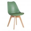 Sedia da pranzo imbottita verde con gambe in legno.